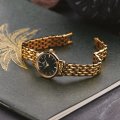 Small gold toned ladies watch Spring Summer Collection Danish Design